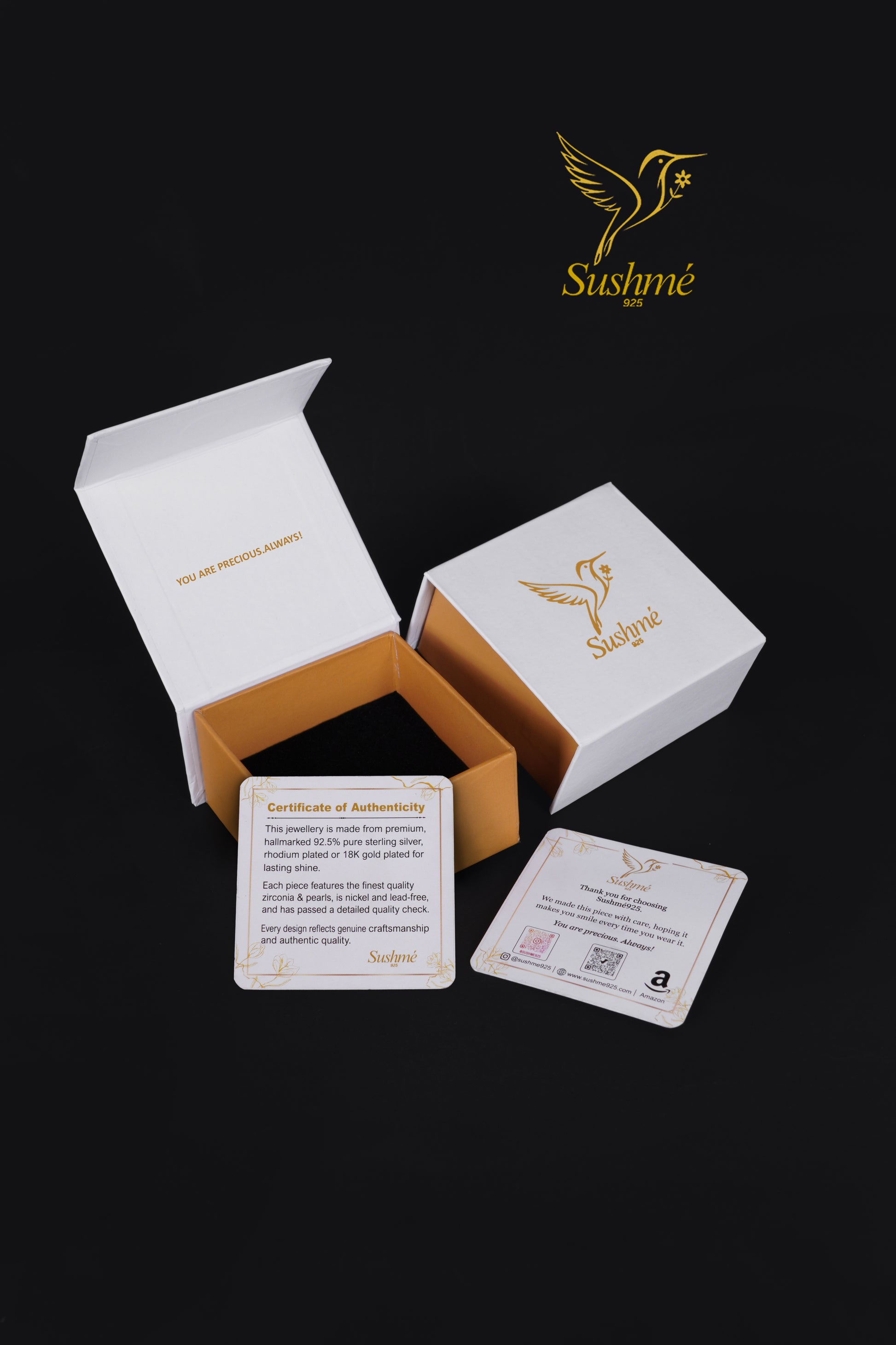 Sushme jewelry packaging with certificates and logo on a black background