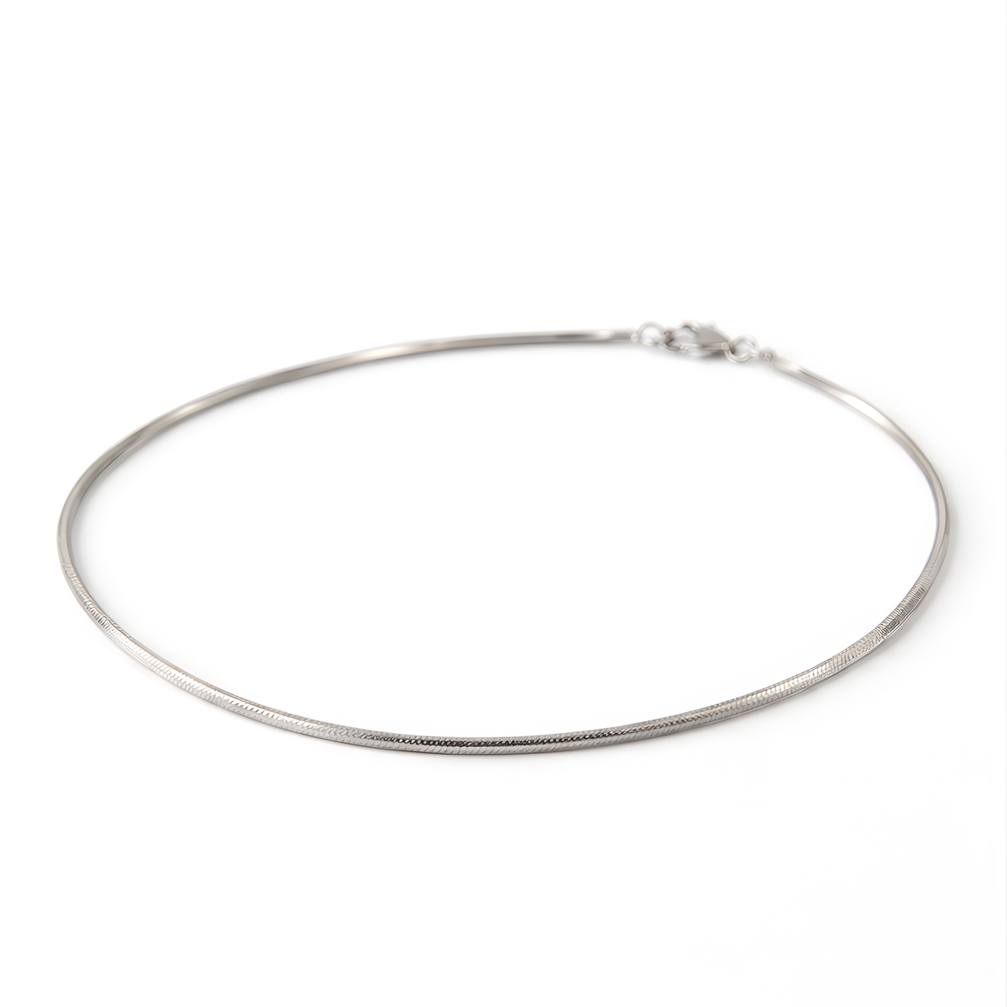 Silver chain anklet on a white background